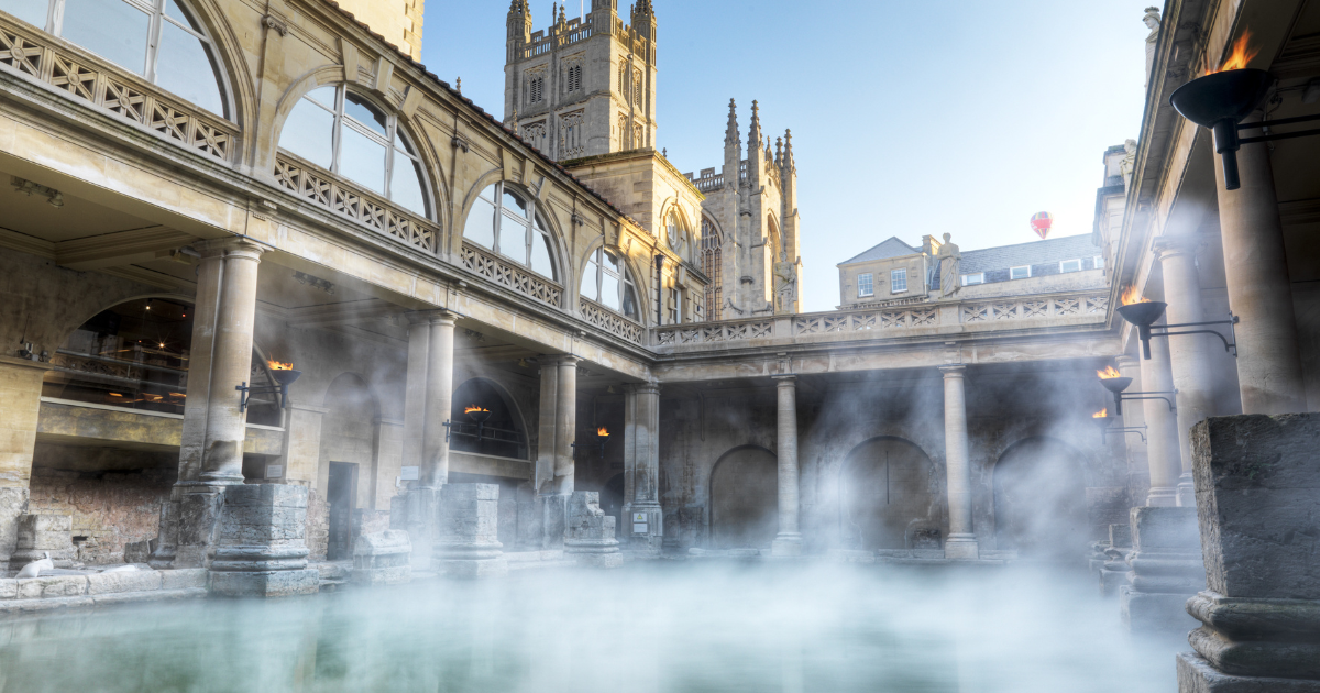 Roman Baths in Bath with steam rising from the historic Great Bath courtyard