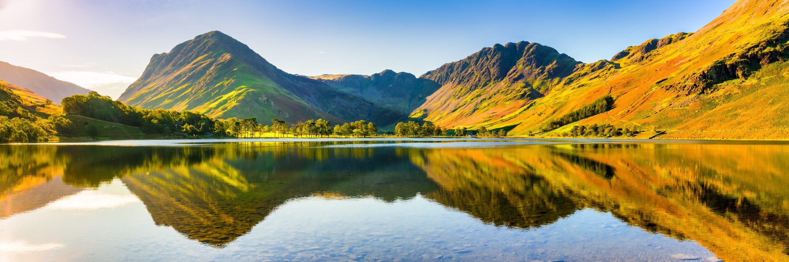 Buttermere Lake in the Lake District with mountain reflections during spring in England