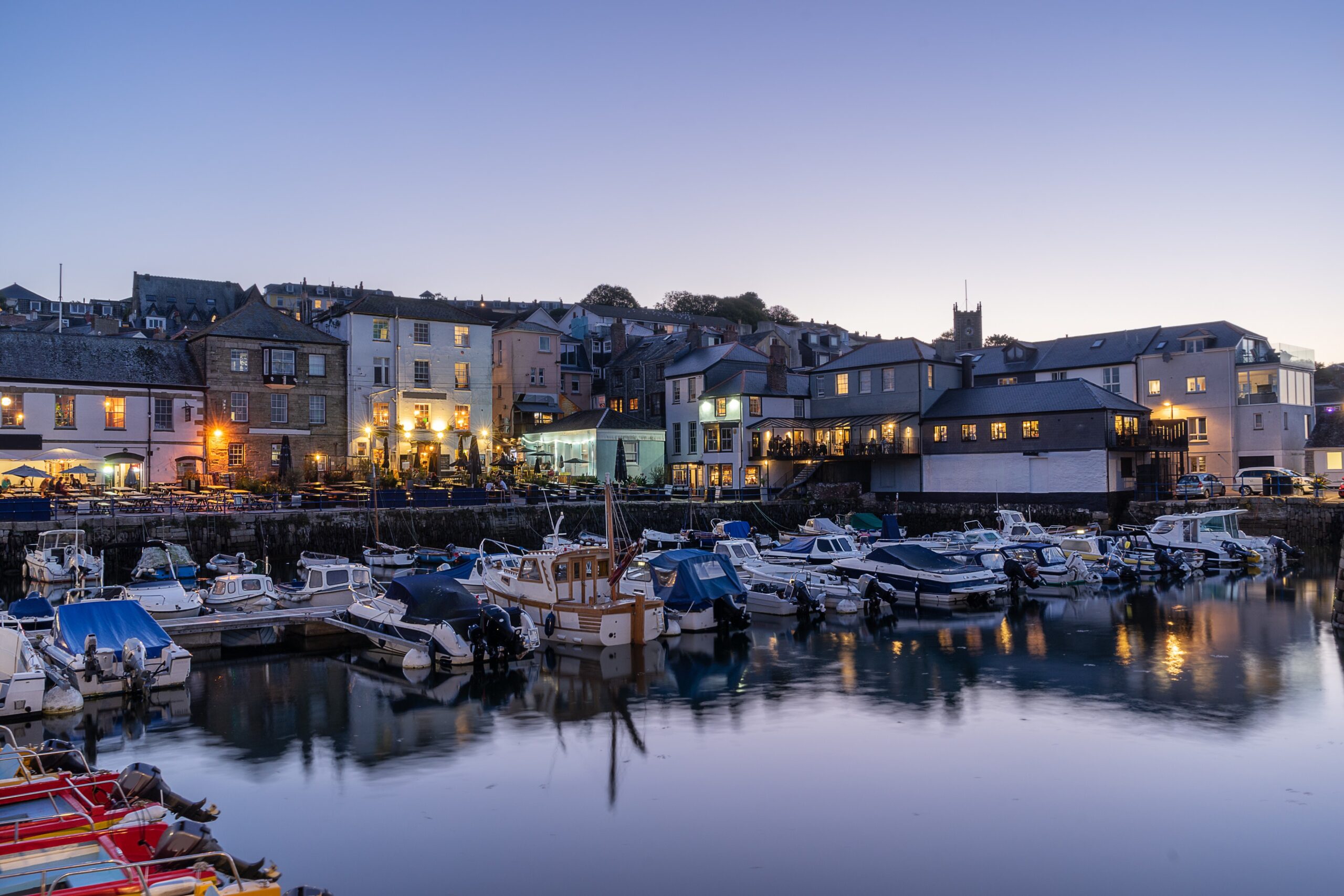 Custom House Quay Falmouth Cornwall harbour waterfront with boats and historic maritime buildings