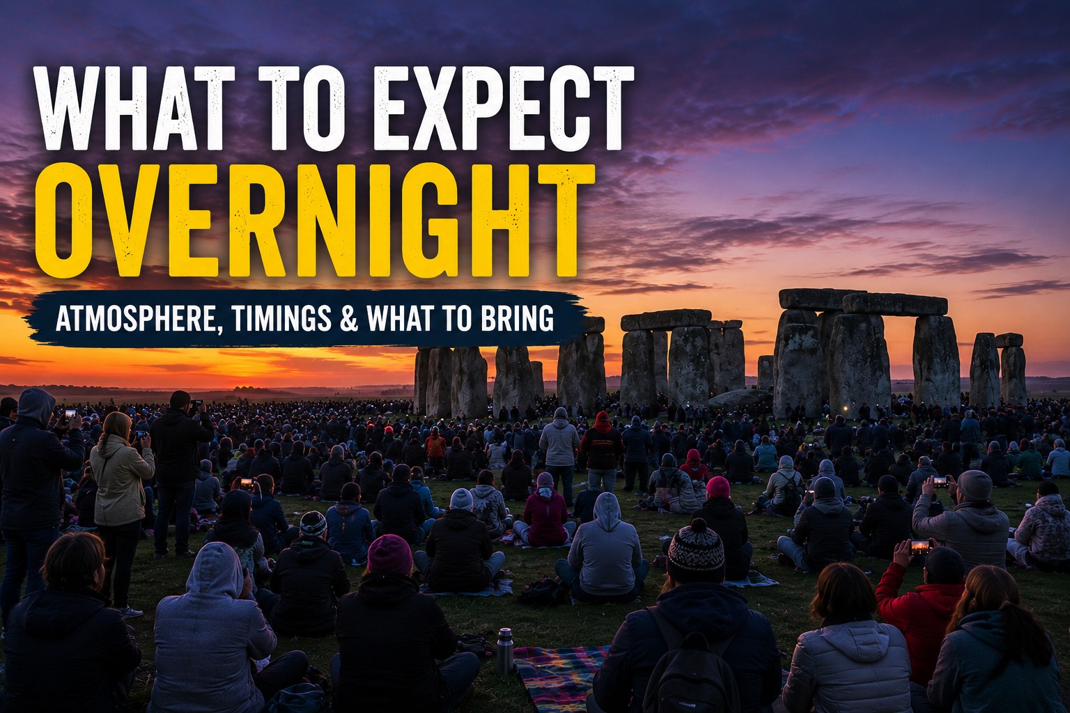 Stonehenge Summer Solstice overnight gathering with visitors watching the monument at twilight as crowds prepare for sunrise.